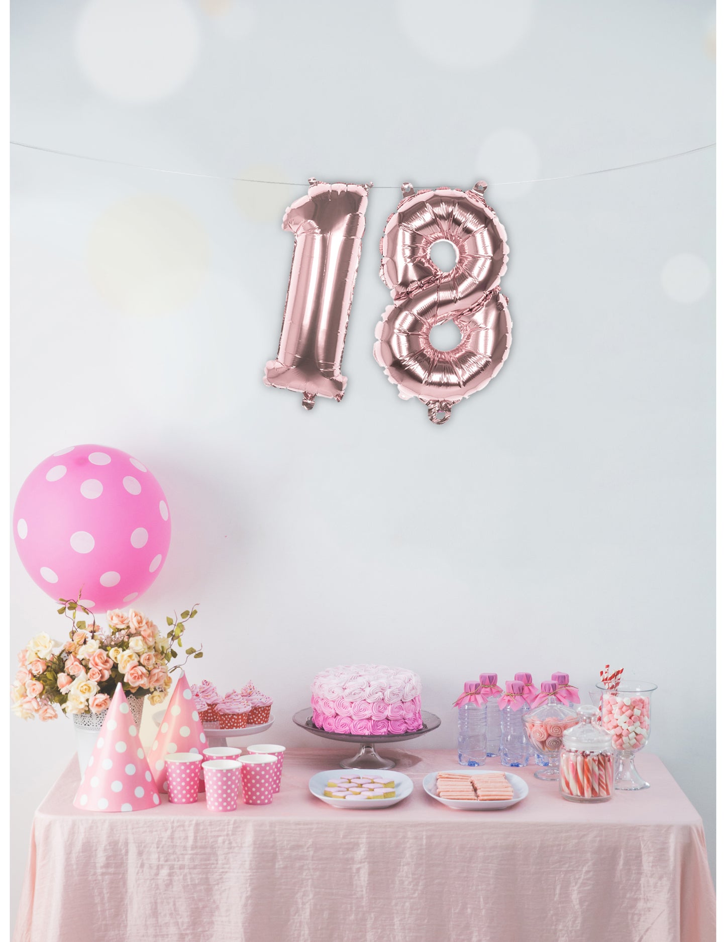Mise en scène du ballon aluminium chiffre pour fête rose métallisé
