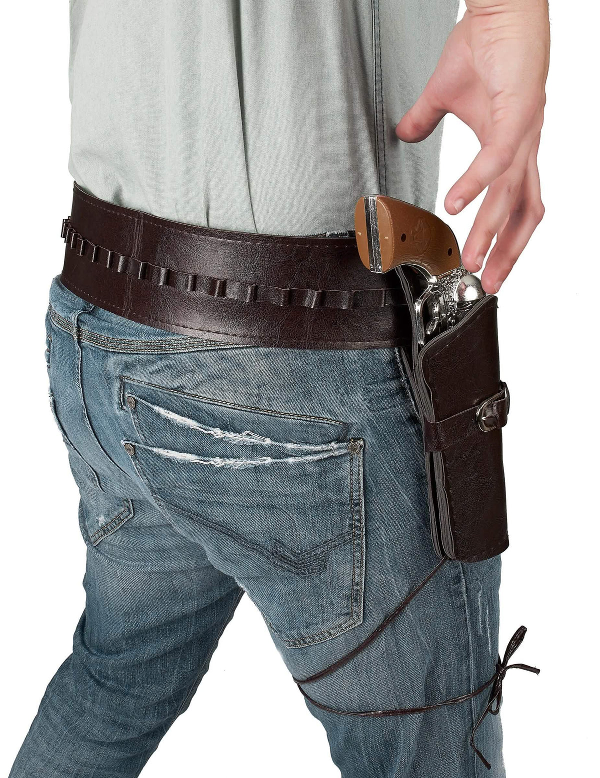 Detail na pouzdro a pistoli z pásku s pouzdrem cowboy pro dospělý