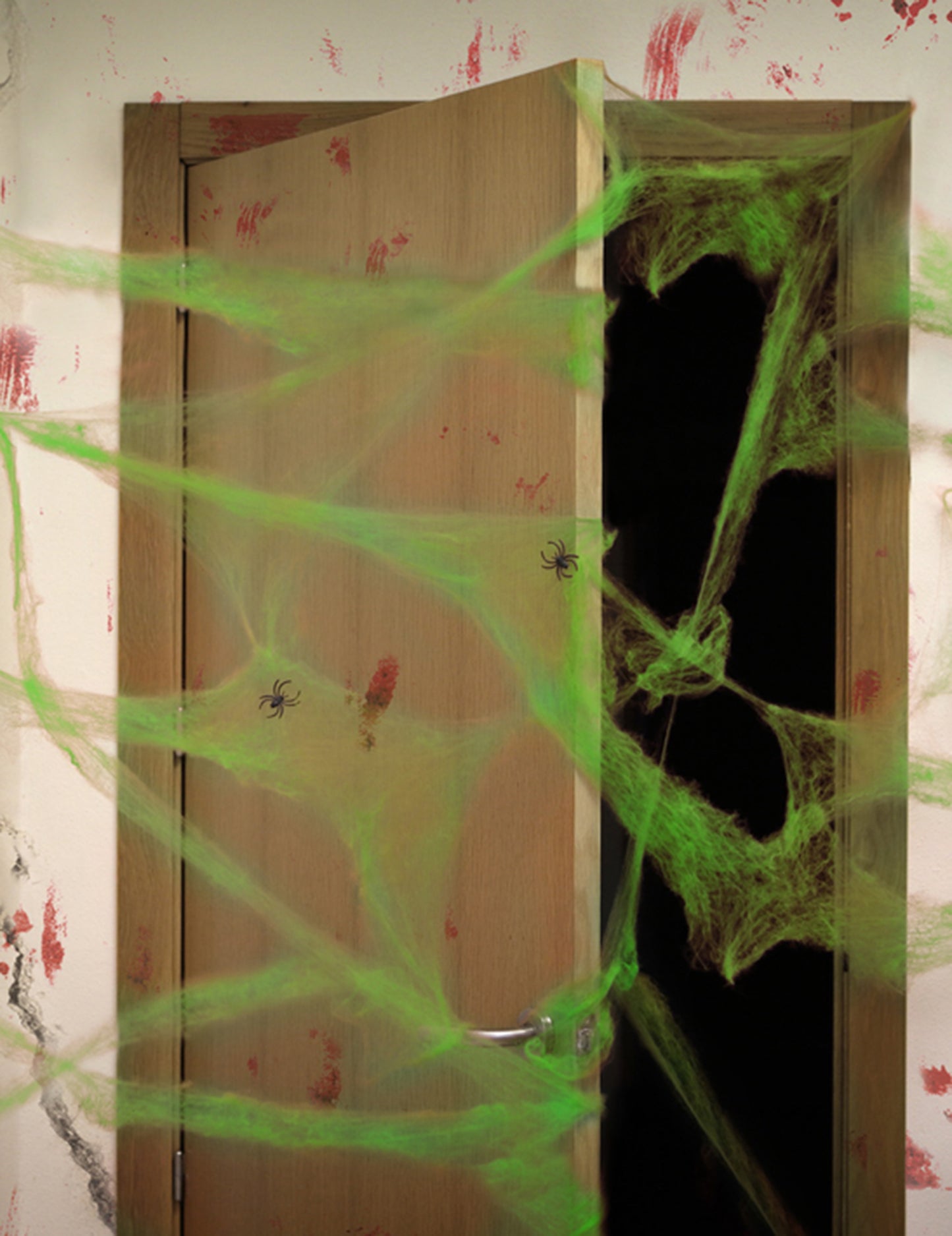 Toile d'araignée Halloween pour décoration verte avec araignées