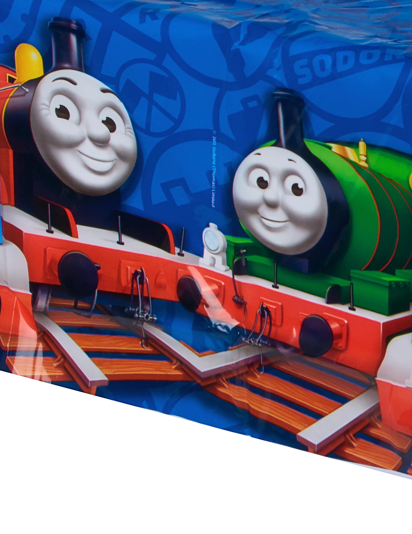 Detail motivů lokomotiv plastového ubrusu Thomas a jeho přátelé