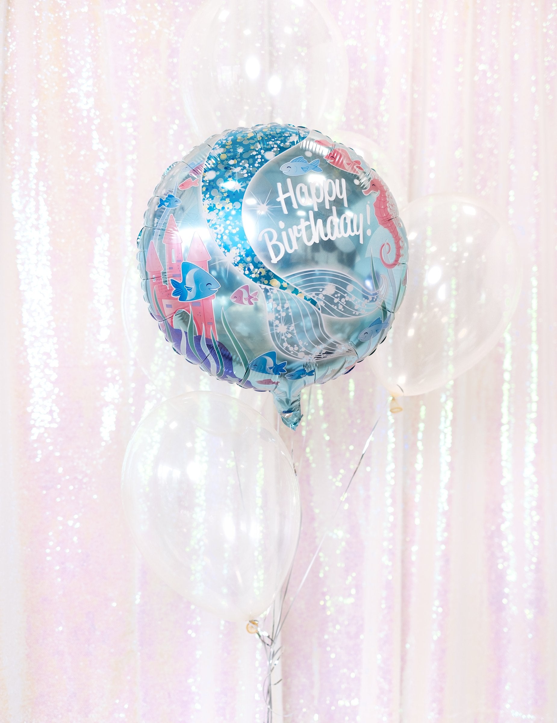 Dekorativní kytice složená z průhledných balónků na oslavu