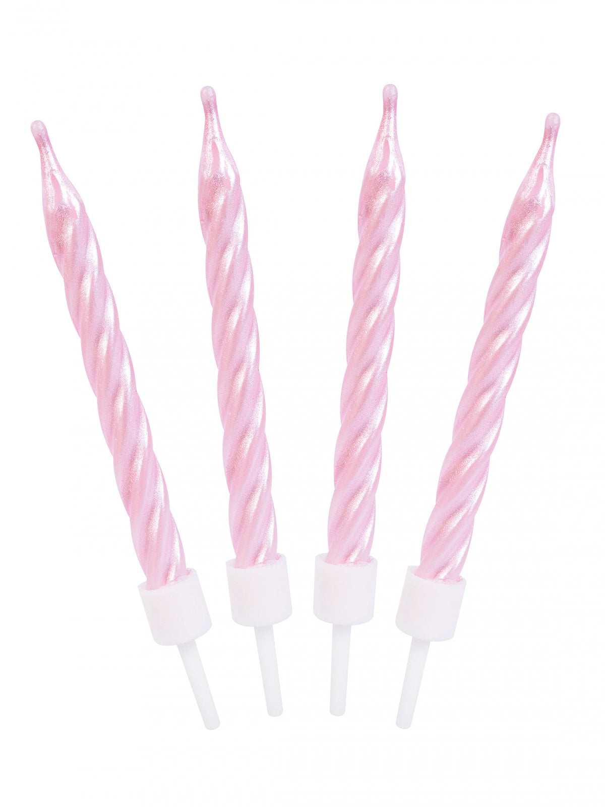 Gros plan des bougies d'anniversaire spirales roses nacrées
