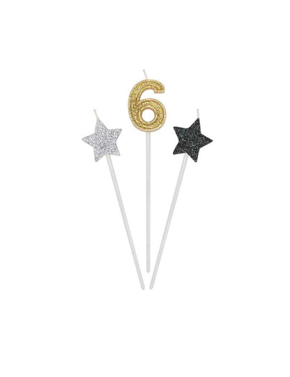 Détail du chiffre 6 et des étoiles des bougies d'anniversaire chiffre pour gâteau dorées argentées et noires pailletées