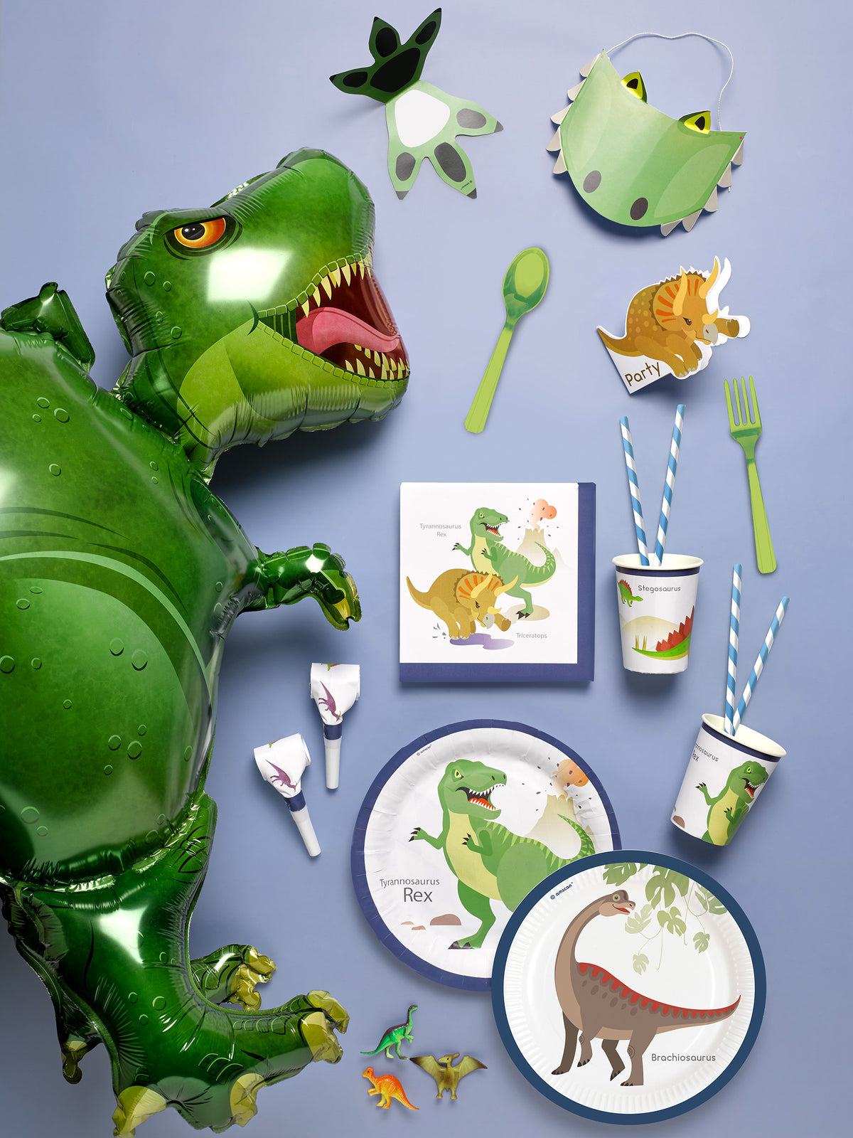 Mise en scène avec accessoires de la casquette de fête grands dinosaures