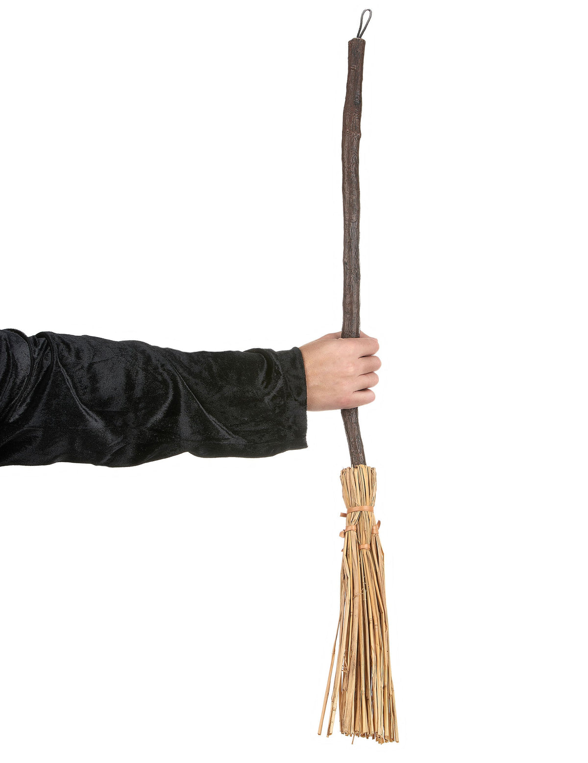 Mise en situation du balai de sorcière tenu par une main