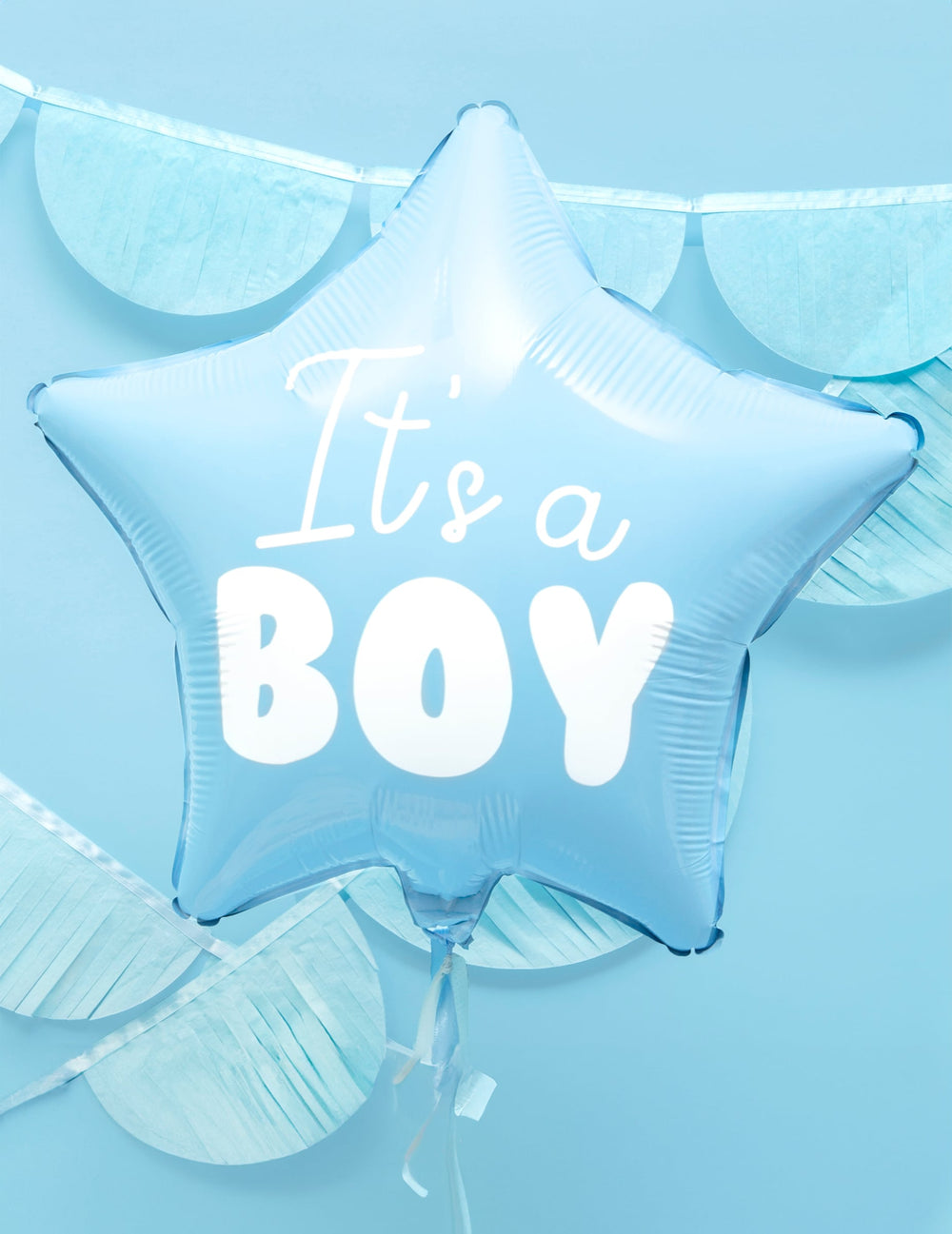 Gros plan du ballon aluminium étoile it's a boy pour baby shower bleu