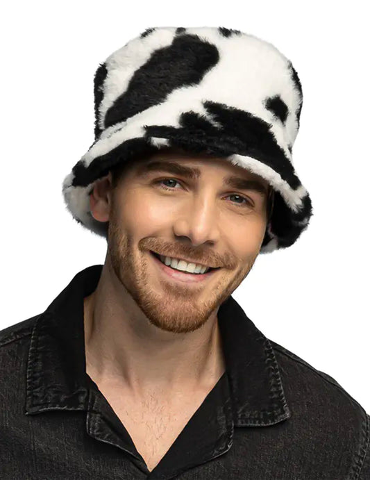 Vue de face du bob en peluche vache