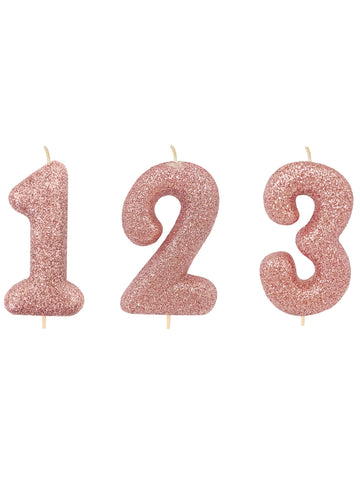 Růžovo-zlatá třpytivá svíčka číslo 7 na špejli cm