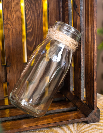Détail de la cordelette en jute sur le goulot de la bouteille en verre Candy bar pour fête