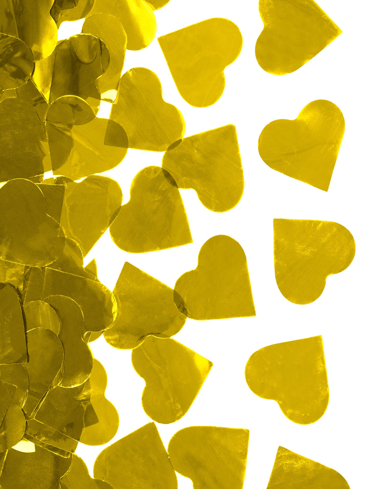 Gros plan sur les confettis du canon à confettis coeur dorés