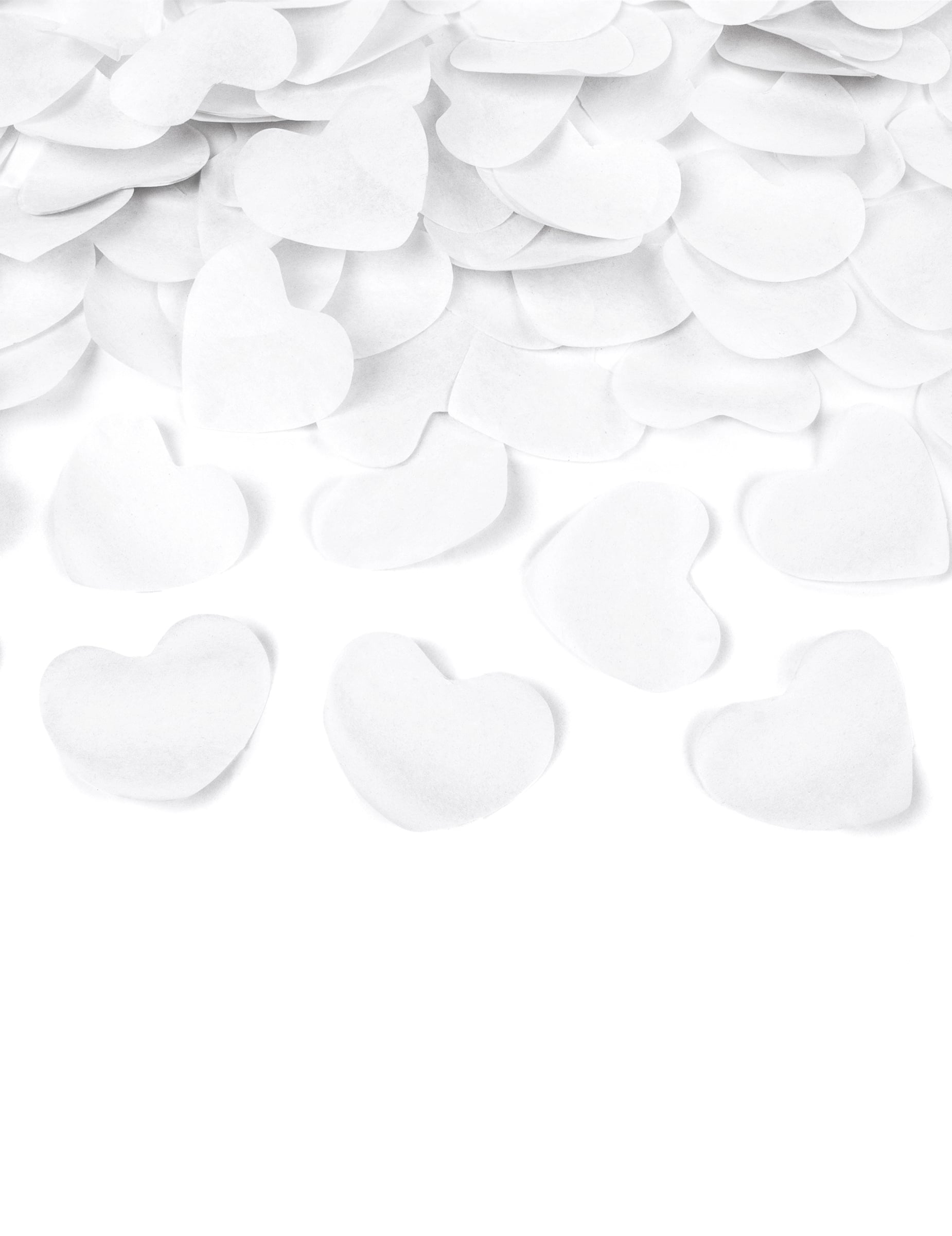 Gros plan sur les confettis du canon à confettis coeurs pour fête