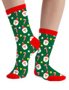 Chaussettes de Noël motifs Père Noël pour adulte vertes avec sucres d'orge et étoiles