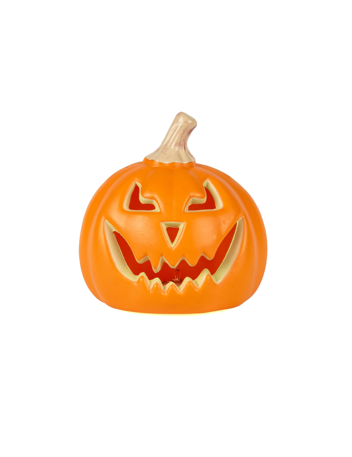 Citrouille lumineuse d'Halloween orange avec visage grimaçant