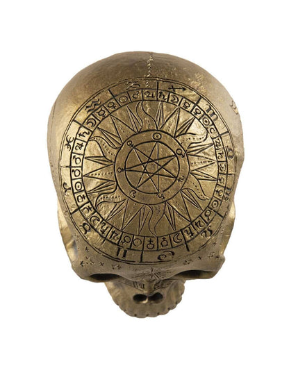 Crâne de squelette avec pentagramme doré