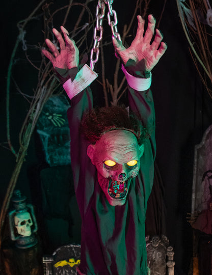 Animovaná dekorace zombie 1,4 m se vrtí a třese