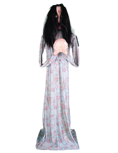 Décoration animée zombie mangeur de cerveau avec robe fleurie et longs cheveux noirs