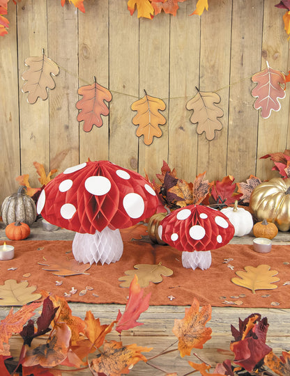Mise en scène de la décoration champignon alvéolé pour fête rouge et blanc