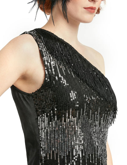 Detail dekoltu se třpytkami a třásněmi dámského kostýmu 20. let