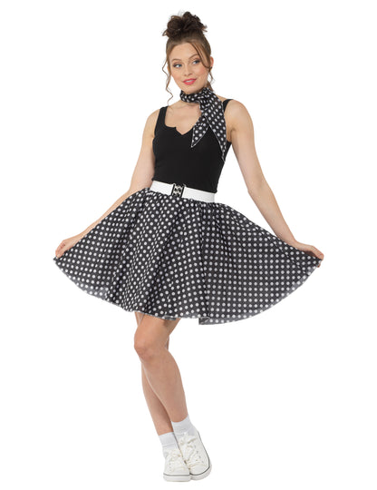 Dámský černý puntíkovaný kostým z 50. let