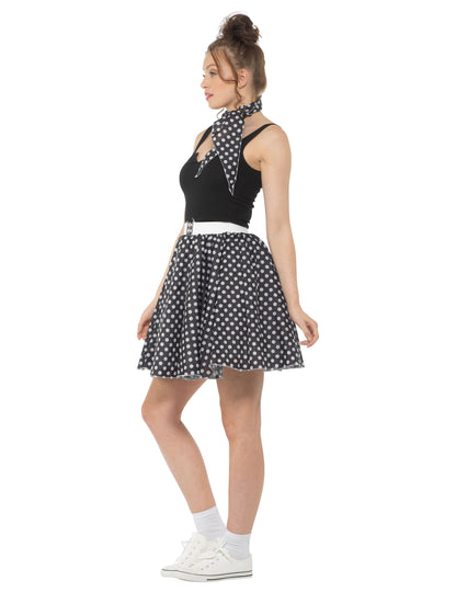 Dámský černý puntíkovaný kostým z 50. let