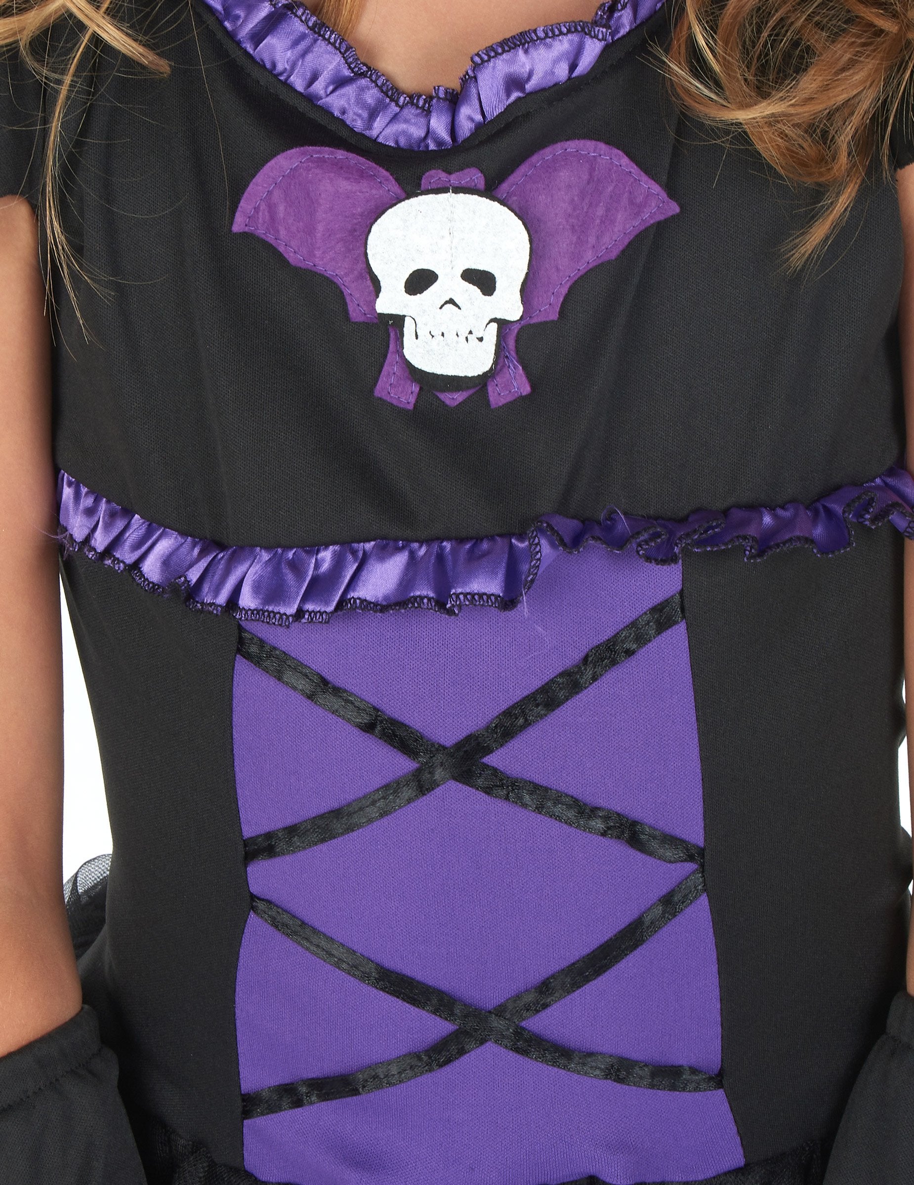 Detail na korzet a lebku kostýmu netopýra