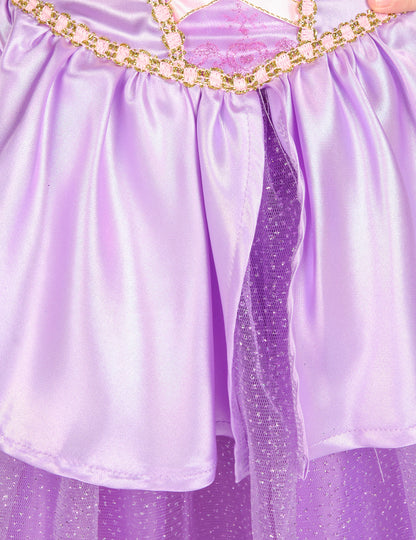 Détail de la jupe en satin et du jupon à paillettes du déguisement deluxe Raiponce