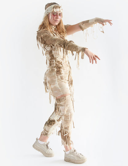 Vue de profil du déguisement de momie sexy pour femme