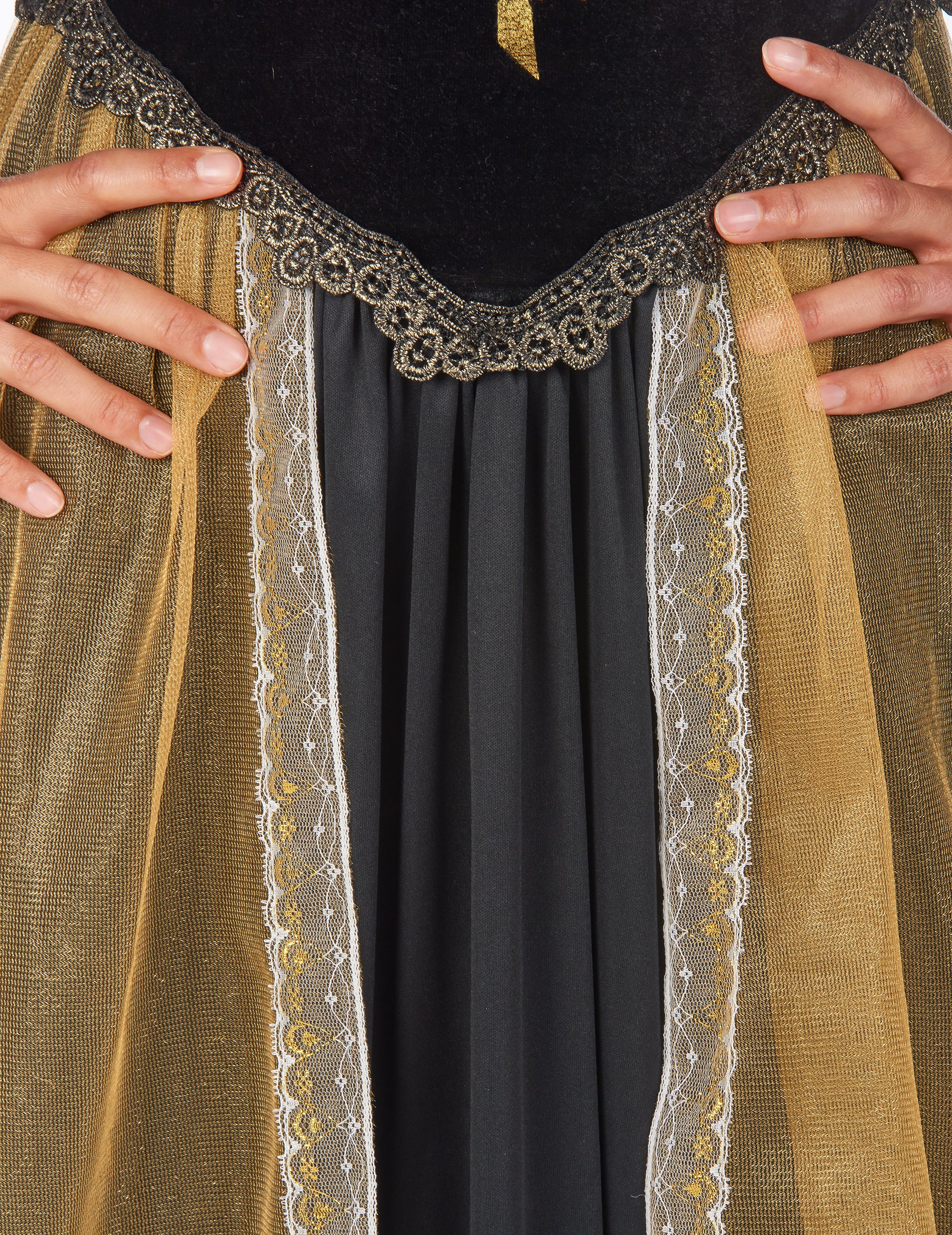 Détail de la dentelle et de la jupe dorée du déguisement reine du Dia de los muertos pour femme