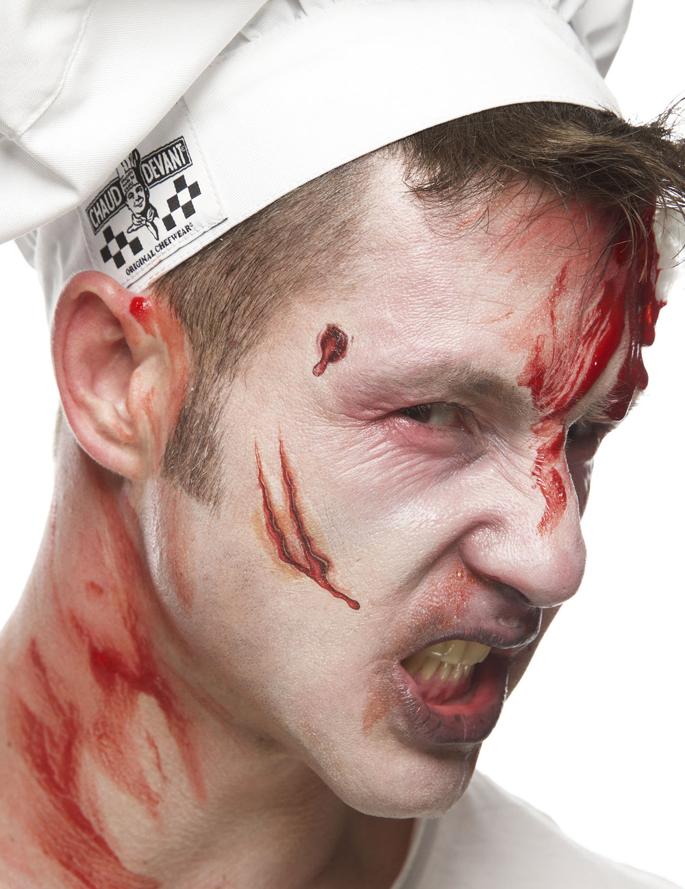 Gros plan sur le maquillage du faux sang en tube visage et corps pour adulte