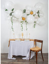 Kit arche de 55 ballons blanche et or avec lierre et feuilles tropicales pour décoration chic