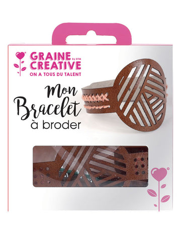 Hnědý kožený vyšívací náramek s geometrickými vzory a růžovou bavlnou