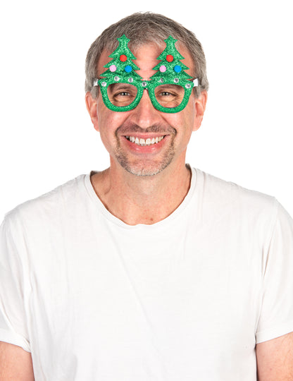 Vue de face des lunettes humoristiques sapins de Noël pour adulte