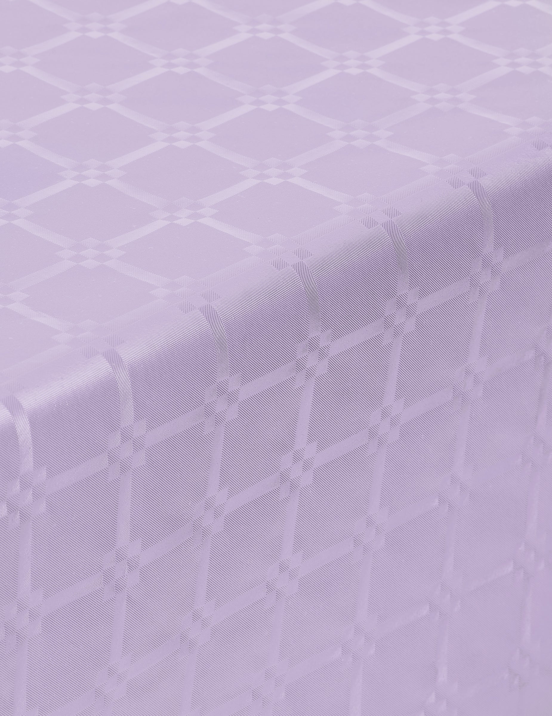 Détail du motif de la nappe en rouleau papier damassé lilas épais