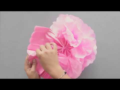 Pompon à suspendre en papier rose 25 cm