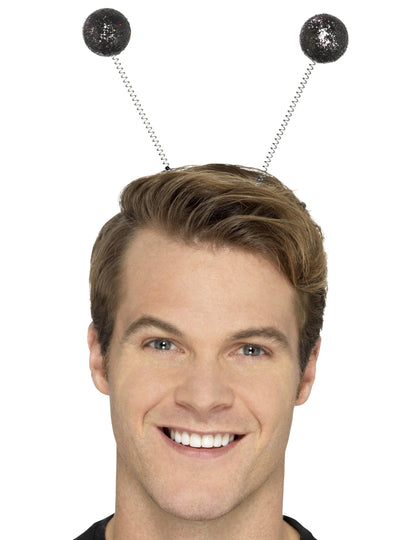 Gros plan du serre-tête boules paillettées pour adulte